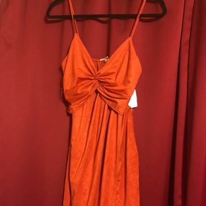 Asymmetrical burnt orange dress